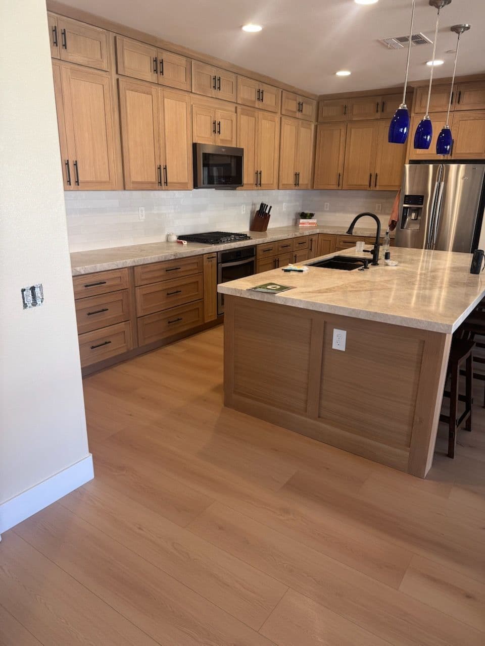 Project Seamless Light Wood Flooring for Modern Kitchens image