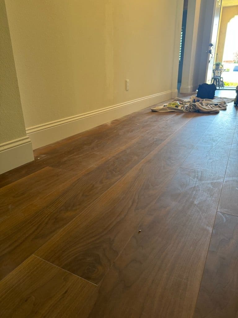 Gallery photos for Stunning Dark Wood Floor Transformation: Image #1