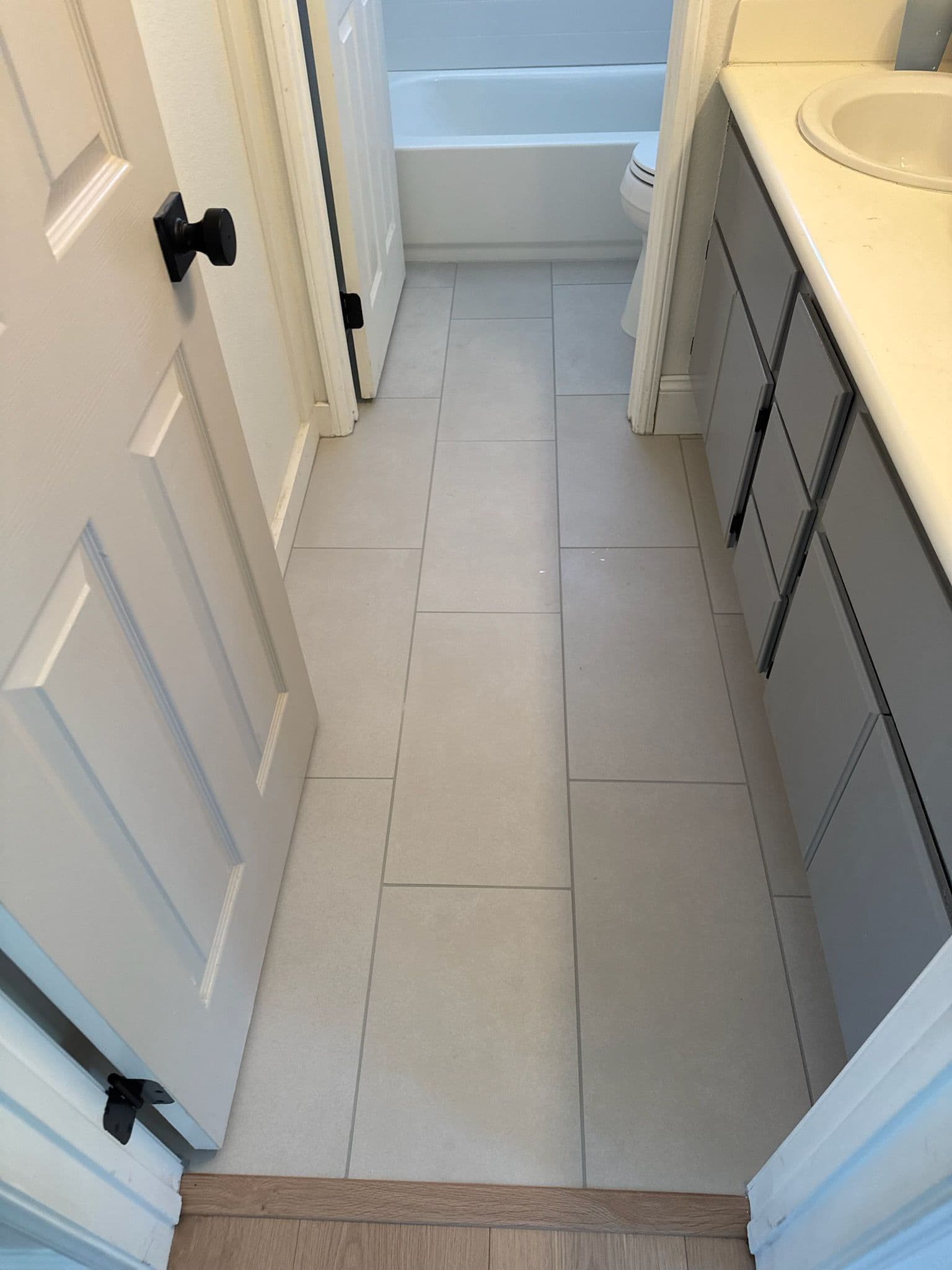 Project Elegant Tile Floor Upgrade for Modern Baths image